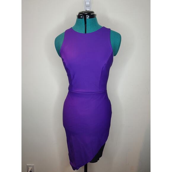 bebe Dresses & Skirts - bebe bodycon purple black racerback dress with asymmetric hem - XS